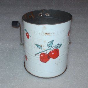 Vintage Bromwell's advertising metal flour sifter